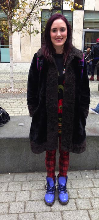 Samantha stays warm in a furry vintage coat