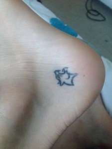 Lianne Davidson tattooed the Cougar logo to her ankle