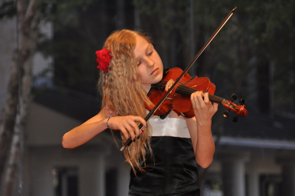Angela at her violin performance Photo by: Angela Medvedeva