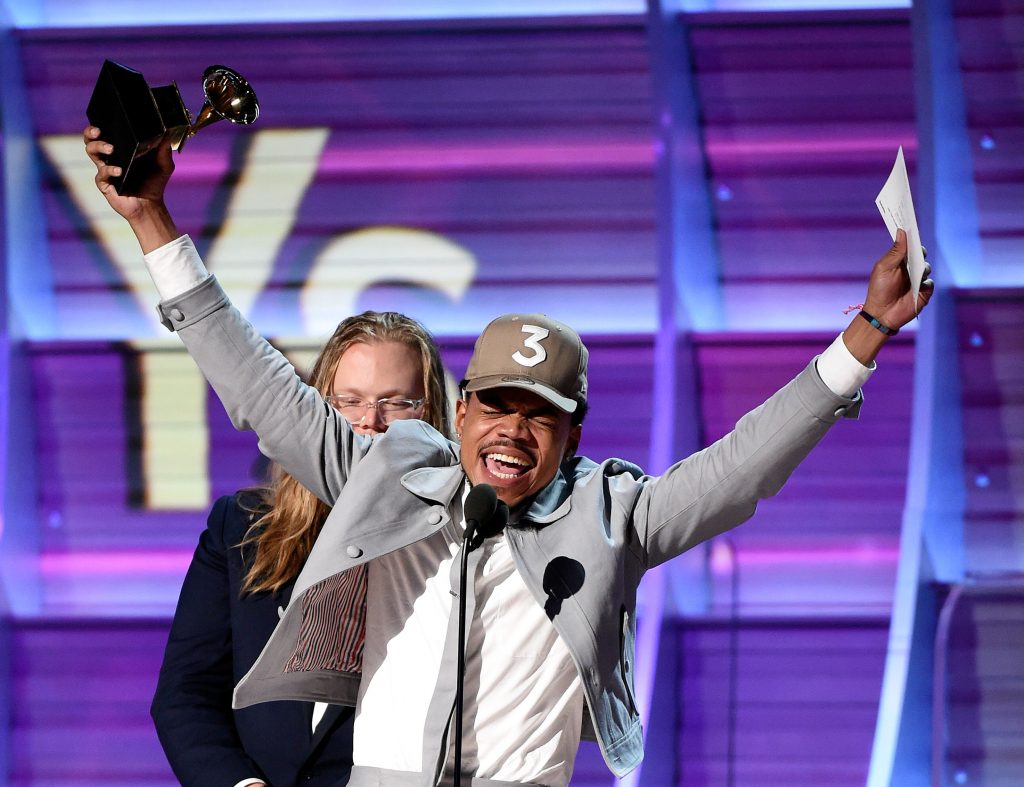 Photo by Frank Micelotta/REX Chance The Rapper accepts his award for best rap album. 