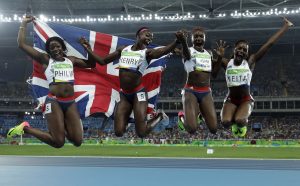 Asha Philip, Desiree Henry, Dina Asher-Smith and Daryll Neita celebrate winning the bronze medal in the women's 4X100 meter relay at the 2016 Summer Olympics in Rio De Janeiro. Photo: Rex Features