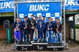 2017 winners Loughborough hold their trophies at the top of the podium. Photo: Karting Magazine