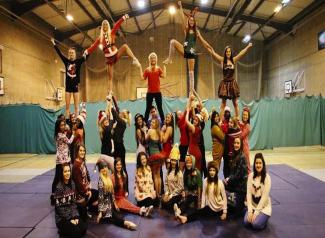 Cheerleaders form a pyramid