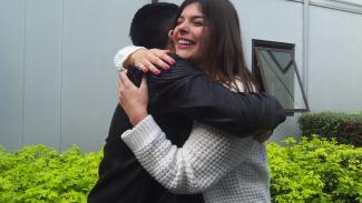 Two students celebrate their win 