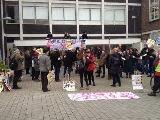 Staff and students fight pay cuts. Photo: Tina Dezart