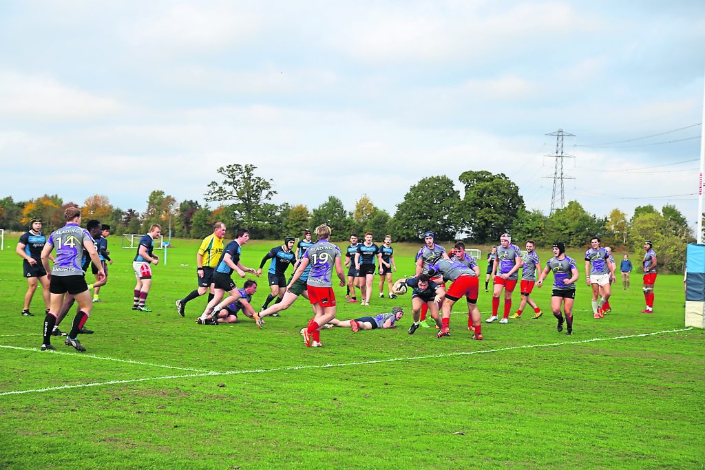 Adam Nillson fights his way over the line in KU's loss to Reading Photo: Iúri Cordas