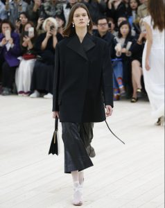 You could just borrow your boyfriend's jacket to get that same, oversized Céline look. Photo: Rex Features