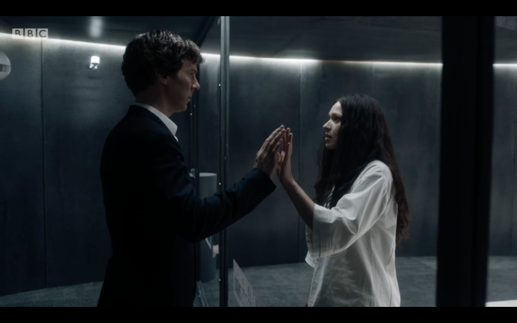 Sherlock (left) talking to his sister Euros at the mid-ocean sanatorium. Photo Credit: BBC