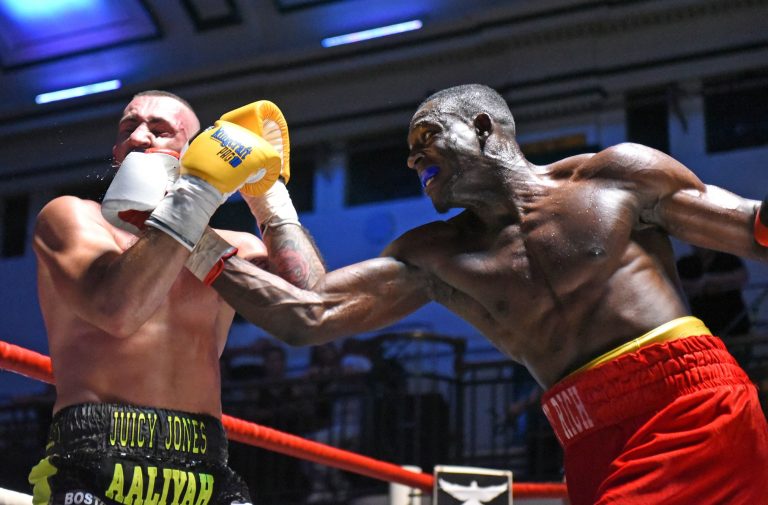 Former gang member and Kingston grad wins first pro boxing title