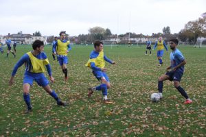 Saif Khan commanding possession against LSE players.