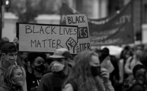 A protest for the BLM movement in London depicting signs.