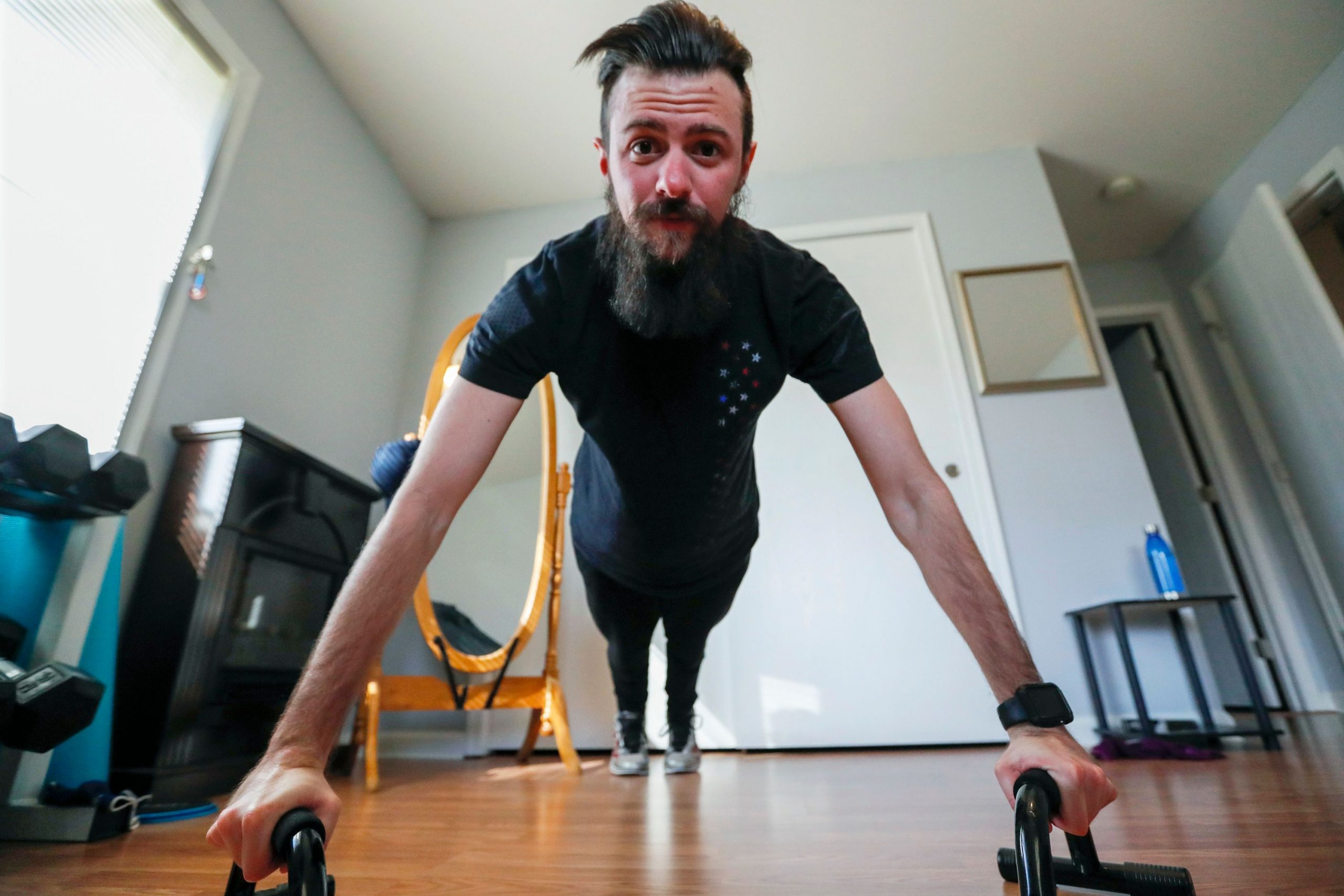 Man working out from home 
