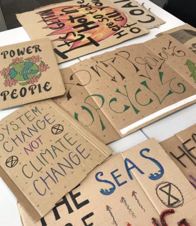 Protest signs designed by the Kingston University Environmentalism society