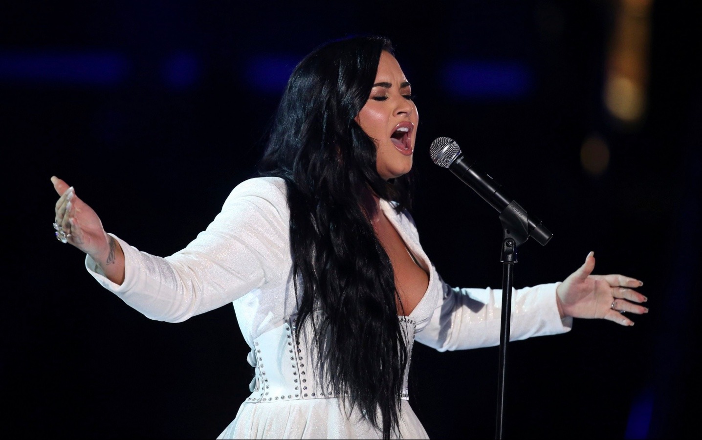 Demi Lovato singing at the Grammy Awards