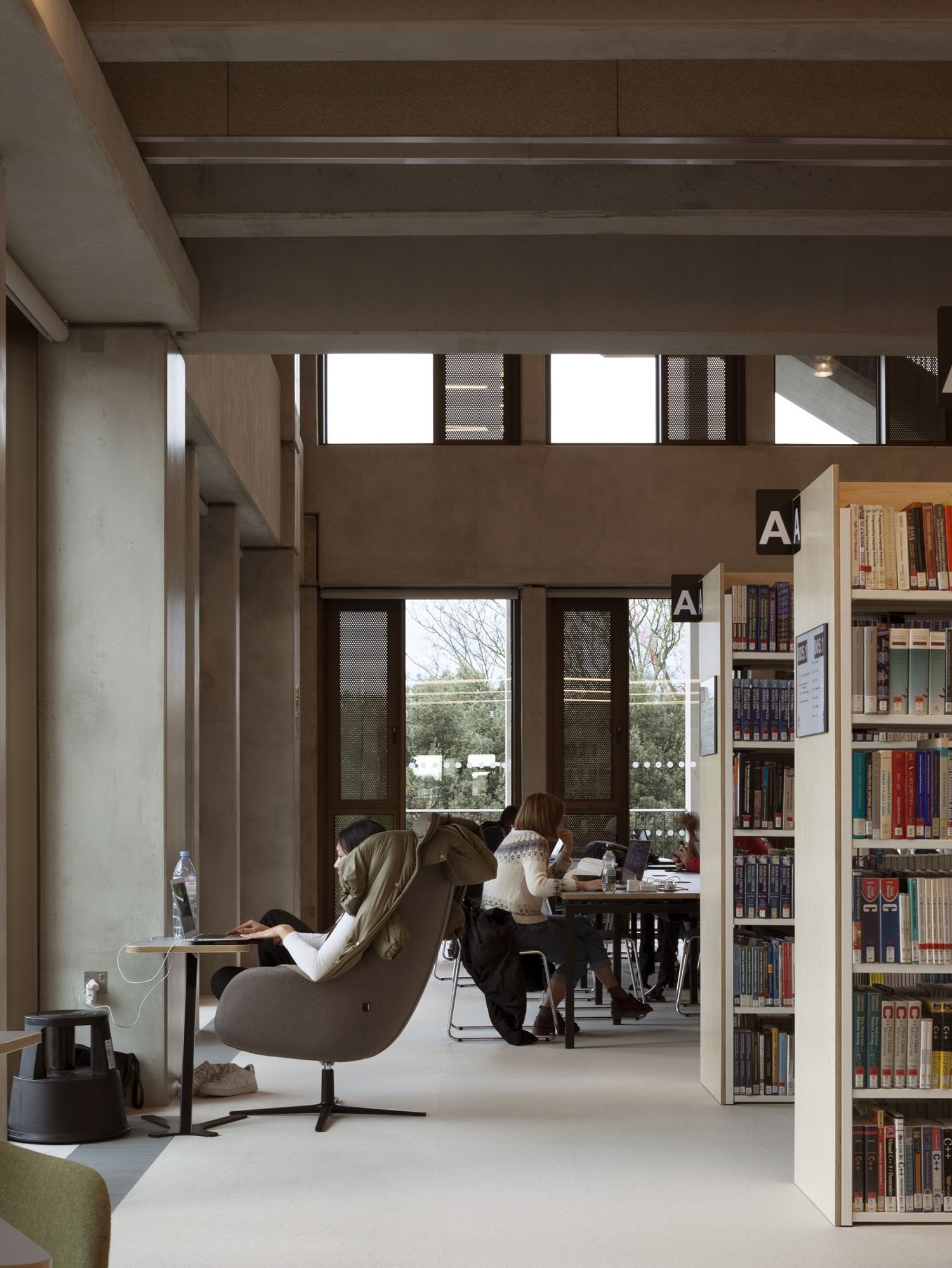 A chair and bookshelves