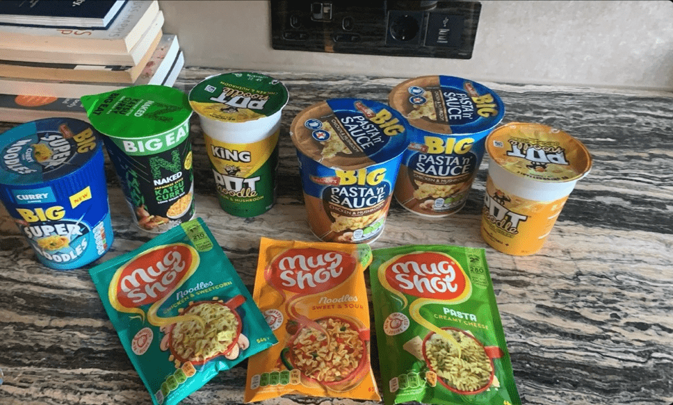 A range of 'just add water' pasta and rice pots which the hotel housed students are having to eat as they cannot cook their own food.