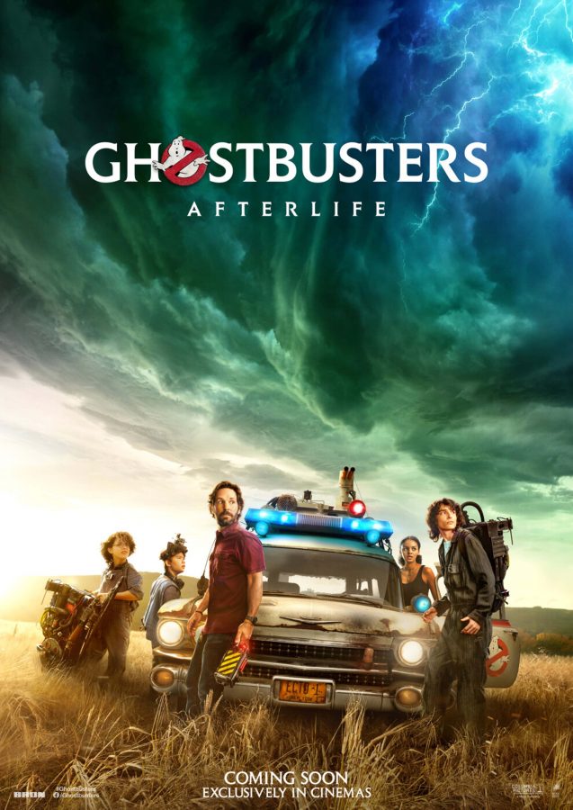 Ghostbusters: Afterlife movie poster of Paul Rudd, McKenna Grace, Finn Wolfhard, Logan Kim and Celeste O’Connor standing in front of the  original Ghostbusters car.