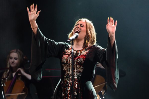 Adele singing on stage