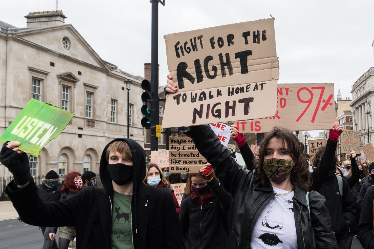 Protest sign reading "Fight for the right to walk home at night"