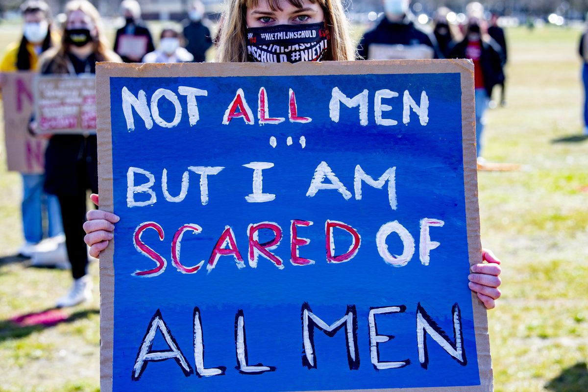 Protest sign reading "Not all men but I am scared of all men"