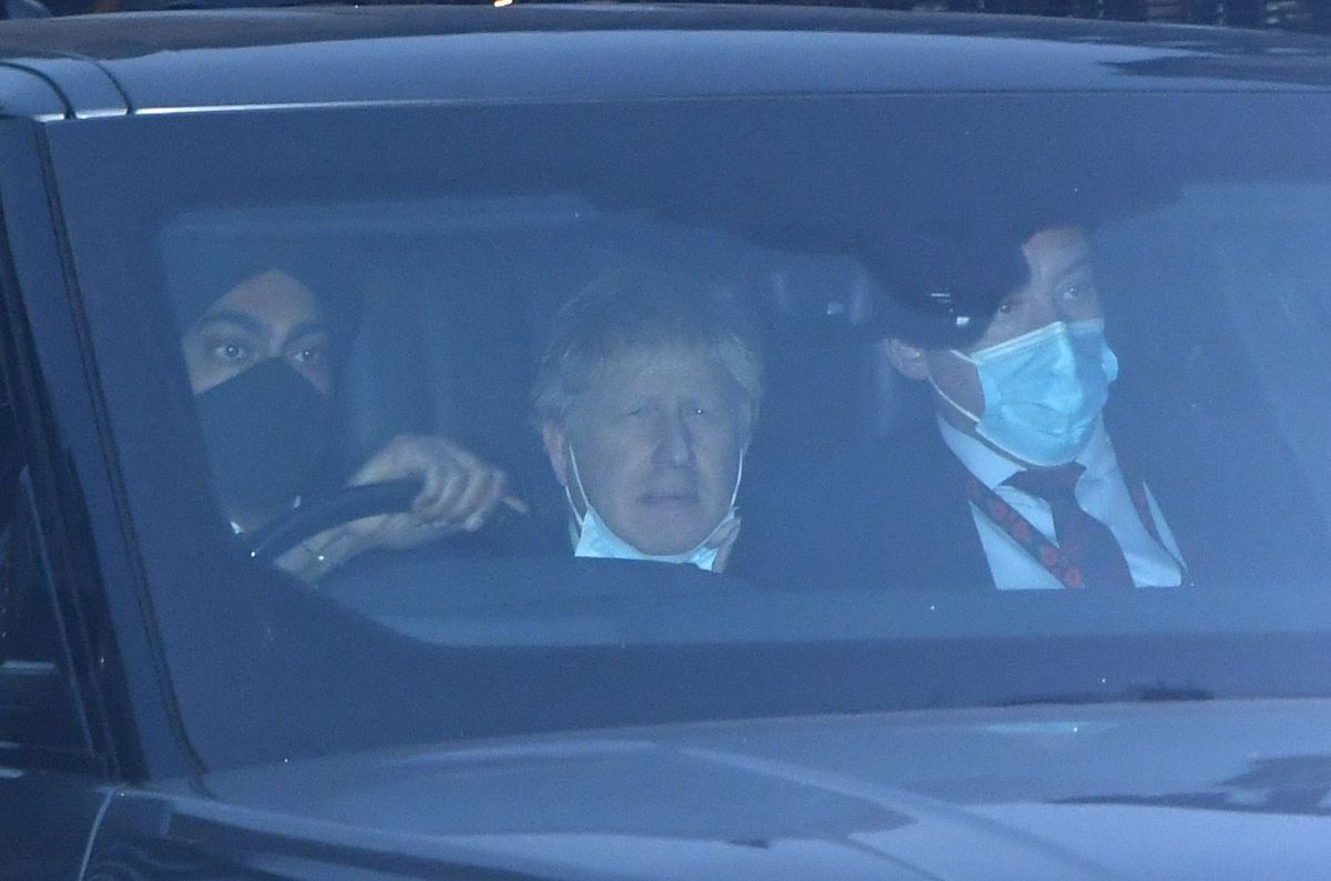 Boris Johnson in car.