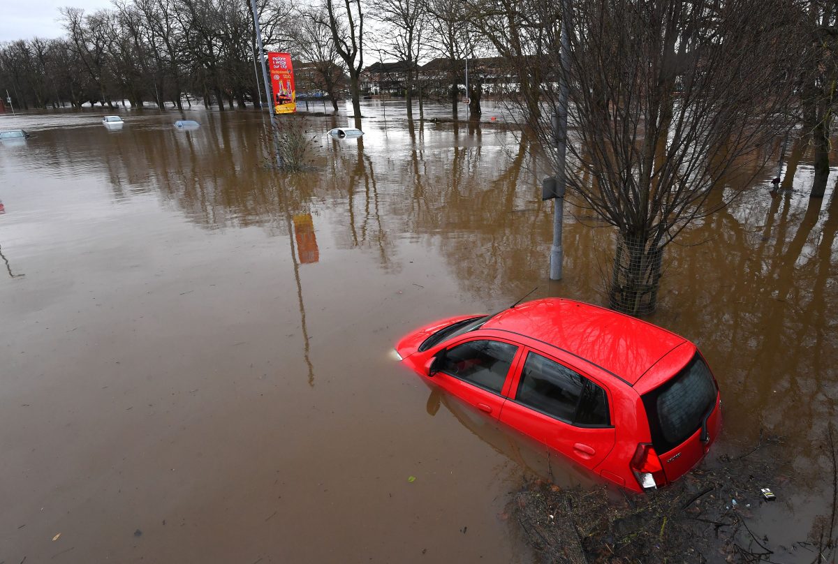 red car submerged under water