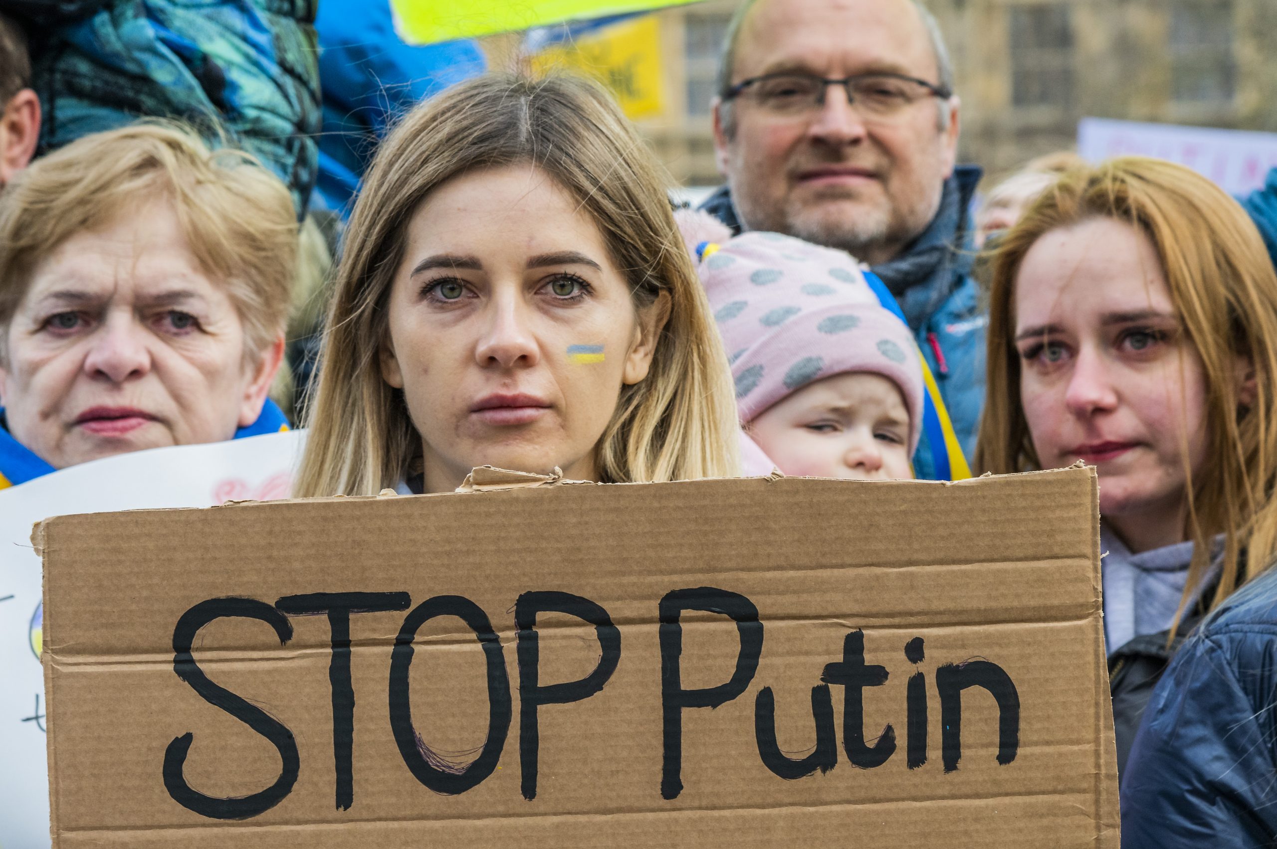 Ukranians and supporters gathered with 'stop Putin' banner