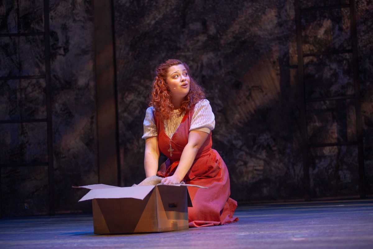 Carrie Hope Fletcher on stage in The Caucasian Chalk Circle