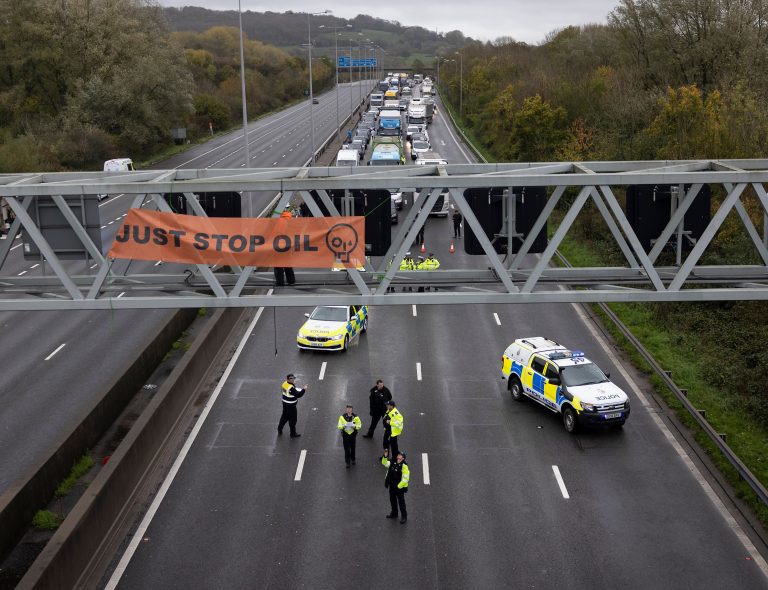 Kingston University lecturer pleads guilty after M25 protest