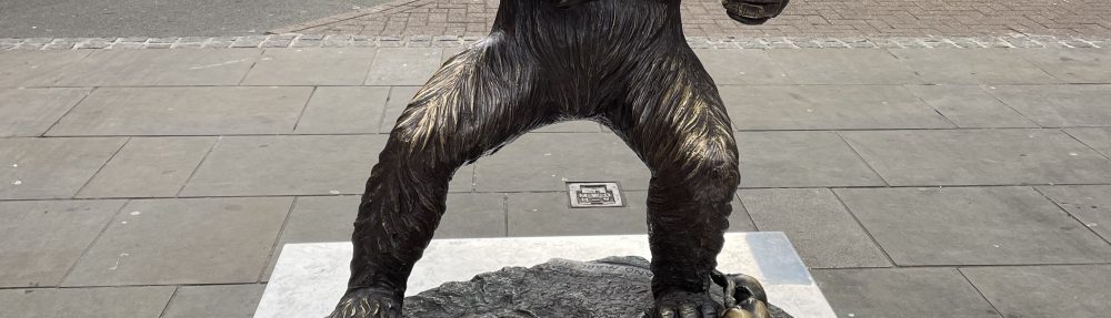 Chimp Statue holding food