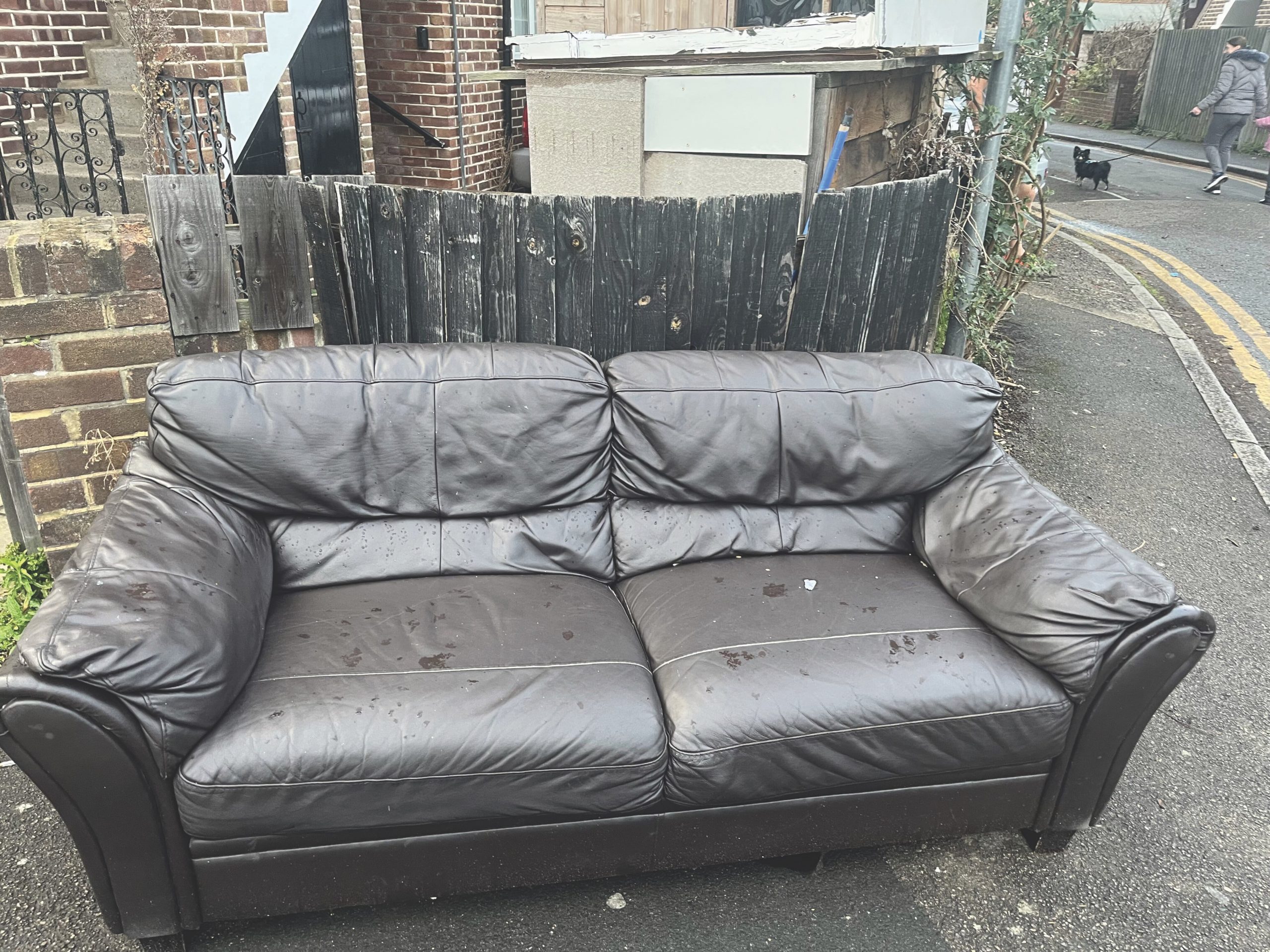 Sofa dumped outside house in Kingston Upon-Thames. Photo: William De Sousa
