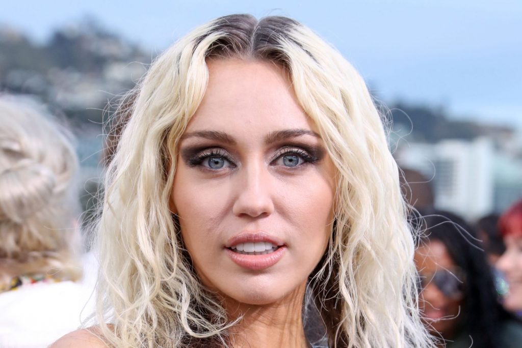 Miley Cyrus appears at a 2023 Versace show